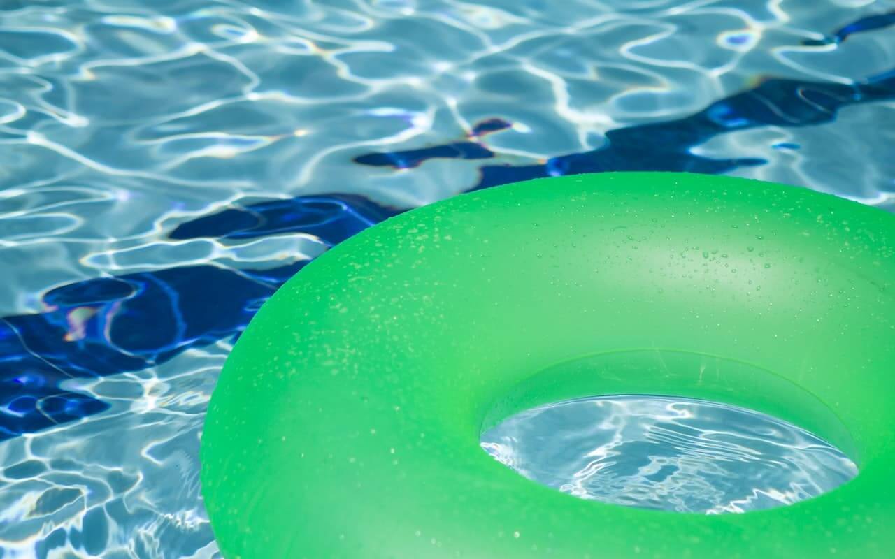 Green inflated pool ring.