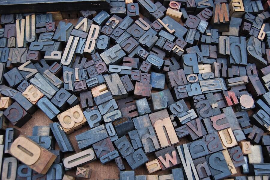 pile of wooden letter blocks