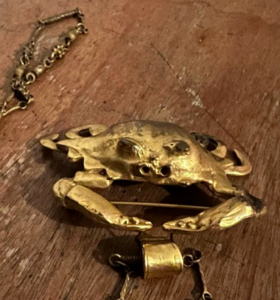 Golden crab on a chain